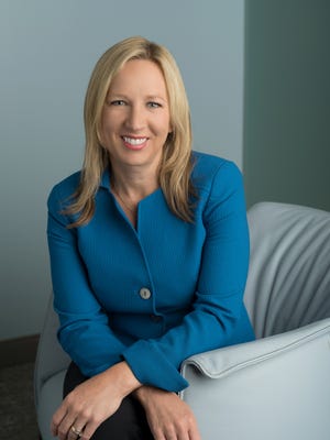 Tina Freese Decker, president and CEO of Spectrum Health, will become president and CEO of a new hospital system if a merger between Beaumont Health and Spectrum Health is completed.