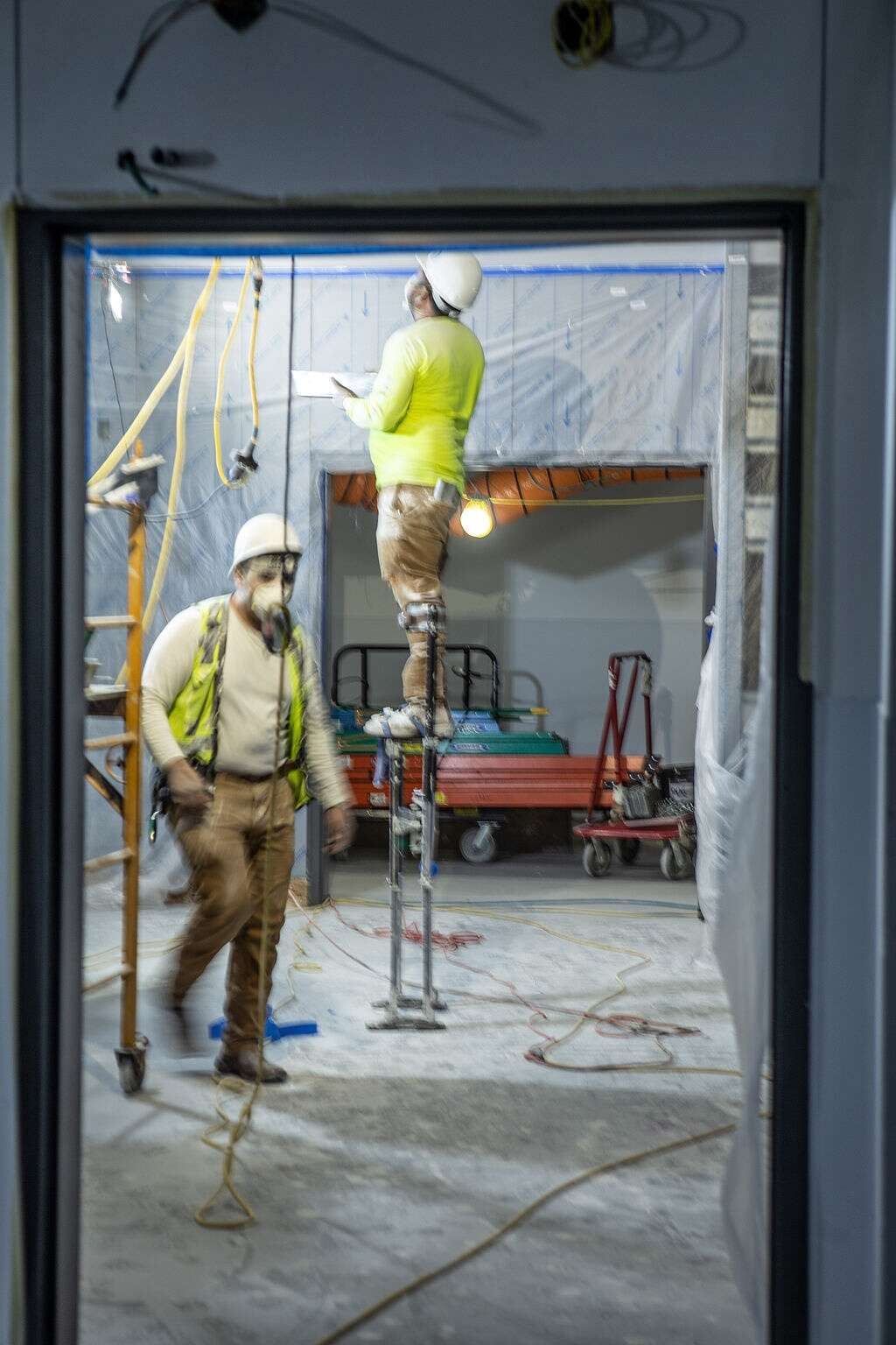 Construction crews work inside one of the operating rooms located within Vail Health's new medical center in Dillon on Friday, August 27, 2021. Once completed, the center will have four operating rooms that'll focus on orthopedic and pain management procedures. | Photo by Michael Yearout / Michael Yearout Photography